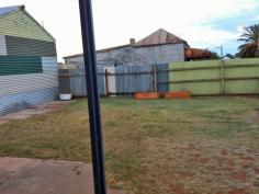  53 Nichols St Broken Hill NSW 2880 $140,000 Comprising the towns original butcher shop with ample parking. The home has been renovated and includes good floor coverings, pressed metal ceilings, evaporative air cooling, three bedrooms, large bathroom with bath, separate shower and vanity, large internal laundry/toilet with spacious lounge room which has been arched into the kitchen/dining area. There is a back foyer with linen press and broom cupboard, a back verandah and second toilet. This is a feel good home with lots of natural light. As a bonus the old shop could easily be converted to a teenager retreat, extra bedrooms or a granny flat or office if wishing to work from home (subject to relevant approvals). This is a very versatile property with plenty of character. Close to Centro Plaza and local school. 