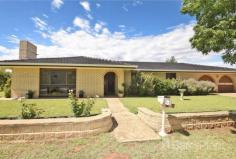  3 Matheson Street Ouyen VIC 3490  $220,000 - $239,000 Enjoy the "quiet life" in this well-appointed family home located within the tight knit progressive Ouyen township. A Formal entry invites you towards a cosy formal lounge with a feature brick wall complimented with a crackling Open Fire Place. Comprising three large bedrooms with BIR's the brick veneer family home has recently enjoyed some modernisation with delightful upgrades to the kitchen and flooring. Living is easy all year round with reverse cycle heating and cooling and easterly facing glass doors to the living area to greet the morning sun. Full lock-up garage with second toilet, town water and ample rainwater storage, all on a 1000m2 plus block, close to schools and shops. Similar homes renting to service nearby industry approx. $230 - $260 per week. 