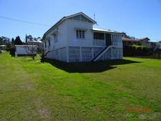  17 Coronation Drive Boonah QLD 4310 $285,000 Queenslander featuring -3 bedrooms + sleepout -Good size kitchen with adjoining dining room -Separate lounge -Polished floors & carpet -1 bathroom -Downstairs laundry and second toilet -Front verandah -Single garage -FULLY fenced backyard -Walk to town/Schools. 