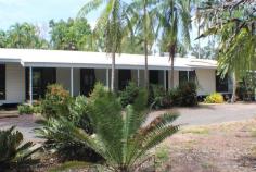  1165 Livingstone Road Berry Springs NT 0838 $635,000 The home is a large home with six bedrooms under the one roof and two bathrooms with great rear screened verandah. As you enter the property along the sealed driveway you you pass the shed with its own HWS and 3 Phase Power. At the house there is a large turning circle at the front providing ample parking plus 2 undercover carport parking bays.  As you enter via the front porch you realise just how big this house is features include: • 	 Six Bedrooms • 	 Two Bathrooms • 	 300 Ltr Solar HWS with booster option • 	 New Roof • 	 Ducted Air conditioning throughout (ducting in need of some repair) • 	 Split Air Conditioning in two of the Bedrooms • 	 Galley Kitchen with large gas 5 burner top and electric oven • 	 Indoor Laundry-Mud Room • 	 Screened Verandah  • 	 Solar Power 6.5 KW back to Grid • 	 3 Phase Power • 	 Chicken -Quail Coop to be the envy of all the Birds in the area • 	 Reticulated Gardens  • 	 Veggie Patch • 	 Shed with third Shower • 	 15 LPS Bore Registered yes that's fifteen litre's per second. 