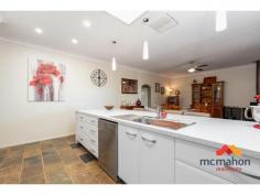  20 Macdonald Street Merredin WA 6415 $475,000 McMahon's are leading the state in Real Estate Promotion! This property has a walk-through ** 3D VIRTUAL TOUR ** Be sure to click the Virtual Tour link to "virtually walk through" this property from the comfort of your home. This one has it all so take your ‘must have’ list and start ticking the boxes. Beautifully renovated, this large four bedroom two bathroom family home is located just minutes’ from the golf course. The two large indoor living spaces and a vast outdoor entertainment area with below ground pool are perfect for a large family to enjoy.  Key features include: • 	 Large lounge/bar/meals space at the front with entry to the study and patio  • 	 Renovated kitchen/family area with large breakfast bar, high ceilings and wood fire heater • 	 Large master bedroom with ceiling fan, walk-in-robe and en-suite • 	 3 large minor bedrooms with built-in-robes • 	 Renovated tiled bathrooms and laundry, lots of storage space • 	 Entertainer L-shape patio and large below ground pool • 	 Powered workshop with roller doors  • 	 10 solar panels, 14000l water tank Merredin is situated in the central Wheatbelt region approximately 260km east of Perth on the Great Eastern Highway. The town offers amenities such as schools, hospital, golf course, leisure centre, shops and cafes. 