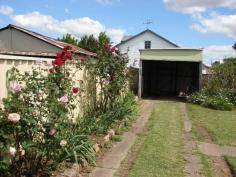  5 Wilson Street Muswellbrook NSW 2333  $226,500- They say that "position" is everything, well this home is well covered up here in North Muswellbrook on a fabulous block in a quite street. Its 853 sqm of perfect flat land with a Three (3x) Bedroom home and lock up garage. The home offers a hallway entry with all bedrooms set with BIW's. The main front room has a walk in robe, and there is a lounge room set with a feature fireplace. Out the back is a sunny meals area, Kitchen and bathroom. The laundry and toilet are separate and the home has stacks and stacks of potential. A shady back yard with great privacy is ideal for the family and it's well fenced and suitable for pets. 