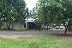  1055 Livingstone Road Berry Springs NT 0838 $545,000 Love to cook and entertain well this country chic kitchen is for you with tons of storage space! If it is lots of space that you need then look no further this property has 28+ acres and is within a short drive to the to a local primary school, sporting ovals, shopping centre with GP clinic, and the Berry Springs Tavern plus it is only 15 minutes from Palmerston CBD. The accommodation is shaded by tall leafy trees and as you walk inside it is has calming glow to it. Country charm with tiled flooring underfoot, a country chic kitchen and large window that frame the mango farm outside and you can also enter via the mud room. Property features.  - Ground level with 3 rooms  - Large open-plan living and dining rooms  - Spacious rooms, all with tiled flooring  - Relaxing rainwater pool to cool off in after a long day  - Rural oasis, minutes to major amenities  - 6 x 6 carport parking for 2 - Cattle holding pen - 10lps Bore - Potential income producing Mango's - 2 Containers for workshop and storage plus cool room. 