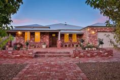  13 Summer Drive Buronga NSW 2739 $449,500 - $493,000 Crafted from recycled red brick and set on a 1216sqm block in a quiet enclave of Buronga, this character home is perfect for a growing family. With a large backyard, sprawling floorplan and outdoor living space, this is a home perfectly crafted those who need room to move. There are four bedrooms, two with built-in closets and the master suite with a walk-in robe and ensuite with twin vanities. There are plenty of living spaces to enjoy including open-plan dining and family room and a living room at the rear of the floorplan. A study is located off the main living space, perfect for those who work from home. When it's time to cater for loved ones, the well-equipped kitchen will impress even the fussiest home chef. Enjoy a 900mm gas cooktop and oven, a large walk-in pantry, breakfast bar and plenty of prep space. Extra features abound and include slow combustion heating, reverse-cycle heating and cooling and a powder room. There is an attached double lock-up garage with additional storage, plus side access to the yard. Step outside to the semi-enclosed alfresco area with a ceiling fan, oven and outdoor toilet for complete convenience and comfort. There's a great-sized backyard for the kids, plus low maintenance gardens. FEATURES: Air Conditioning Built-In Wardrobes Fireplace(S) Formal Lounge Garden Secure Parking Study. 