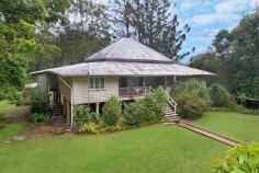  357 Diddillibah Road Diddillibah QLD 4559 Offered to the market for the very first time is this exceptional property 'Ferndale', a gracious 105 year old Queenslander. Home to three generations of a pioneering Diddillibah family and tucked away on a glorious 20 acre parcel of land with lush rainforest creating privacy and sanctuary. Built in 1913, the original home was just four rooms with verandas, before extensions post-World War Two and in the early 1950's created extra space for the next generations of family. High-set, the home is in mostly original condition, and is complete with three bedrooms, one bathroom, separate toilet, large eat-in kitchen, front verandah, separate living rooms, laundry and storage/parking space under. The home itself is in need of renovation and restoration to fully restore it to its former glory and make it shine again. It is comfortable and liveable whilst undertaking the project, and has classic features of this era such as high ceilings, VJ walls, timber floorboards (under coverings) and gorgeous original windows. Whoever purchases this grand old lady has an opportunity to recreate not only the grace and charm of its vintage, but to create something resplendent, a testament to its proud history, as well as the future that lies ahead... 'Ferndale' still has so much love to give, so many memories waiting to be made, it is crying out for another family to call it home'. The acreage is absolutely pristine, mostly rainforest with an expansive cleared area around the home. The driveway into the property is pure magic, as you meander your way in through the majestic trees. Originally it was part of a much larger parcel of land, 160 acres was selected in 1884 and the family grew many different crops including citrus, pineapples, sugar cane, beans and strawberries. They also generated additional income through the harvesting of timber. Located east of the Bruce Highway, just a short drive or bus ride to premium private schools, and 15 minutes to Maroochydore CBD, beaches and the Sunshine Coast Airport, as well as a 70 minute drive to Brisbane, in a dress-circle acreage belt with some of the Coast's finest acreage properties. 'Ferndale' can also add location to its appeal. Properties of this vintage are extremely rare on the Sunshine Coast unfortunately. This is an exceptional offering and opportunity, and being a deceased estate must and will be sold. 