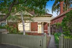  10 Grace Street Malvern VIC 3144 Enjoying a tranquil setting in a tree lined street, this charming solid brick Edwardian residence located in a coveted position in Malvern boasts generously proportioned interiors flooded with natural light. Beyond a traditional façade and beautifully landscaped gardens, this captivating home retains many trademark period features including high decorative ceilings, coloured leadlight, timber fretwork and polished hardwood floors. An L shaped hallway flows past a spacious living room, three bedrooms, all with built in robes, and a bright family bathroom. At the rear, a functional kitchen equipped with Miele dishwasher, gas cooktop and ample storage offers a casual meals counter and opens out to a private north east facing courtyard, perfect for relaxing in the morning sun. Includes dedicated laundry and ducted heating. Perfectly positioned in close proximity to Glenferrie Road and High Street shops and cafes, Malvern Public Gardens, Malvern Central, Harold Holt Swim Centre, transport and excellent schools.  