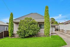  5 Russell St, Balgownie NSW 2519 $730,000 - $770,000 A cottage-style home of abundant ‘blank canvas’ appeal, this cosy residence sits pretty in a strongly sought-after Balgownie pocket. Flowing through a traditional one-level floor plan complete with elevated ceilings, it boasts three squarely proportioned bedrooms, open-plan living, a sweet full-width front porch plus an entertainers’ pergola in the private east-facing backyard. Its tranquil yet convenient position underscores an irresistible opportunity, within easy ambling distance of leafy local parklands, city bus stops and the vibrant heart of Balgownie village. - Tremendous project potential – renovate for comfort or profit - Charming street presentation on a low-maintenance 418sqm block - Bright and original eat-in kitchen boasting practical cupboard storage - Tiled for ease of care, the bathroom reveals a shower plus separate tub - Spacious bedrooms showcasing wall-to-wall built-in robes throughout - Long side drive to carport and generously sized lock-up garage to rear - Stroll to Judy Masters oval, cute boutiques, cafes and restaurants. 