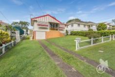 16 Towns Street, MITCHELTON QLD 4053 | Madeleine Hicks Real Estate Brisbane Land Size- 607 Sqm Rates- $621.16 per Quarter Potential weekly rent- $390-$420 per week (un-renovated) After over 50 years of memories, this original post war home has come on the market. Ideally located at the end of Towns street and directly across from park land sits this humble home ready to be renovated by the new owners. Built in 1961 this home offers the avid buyer huge opportunities, tradies will love side access to the huge double bay shed while still offering ample yard space for the kids and pets. Located across for the Heiner Park North, allows you the extra space without any maintenance, and is a huge feature of this home that costs you NOTHING to upkeep! Thanks, Brisbane City Council! The Mitchelton market is on the move, and these original homes are selling quickly to first home buyers, renovators or even new home builders looking for prime land to build on. Just a quick walk to Oxford Park Train station, this is ideal for commuting to the city for work. If you’re in the market for a great home to renovate in Mitchelton make sure you put this home on your open for inspection list! Contact Justin on 0422 292 268 Property Features- -Originally features throughout -Hardwood timber floors under the carpet -Externally painted only 18 months ago -Side access to Double bay lockable garage -Ideally located across from parkland -High and dry at the top of the street -Plenty of under house storage. Land:   607 m² Bedrooms:   3 Bathrooms:   1 