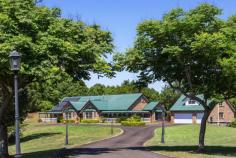  96 Bundara Park Dr Tuckombil NSW 2477 $1.55m Grand in proportions & large in size - this home is perfect for large or blended families - all wanting their own space to grow & stretch on this elevated two & a half acre private estate! At the end of a picturesque country cul-de-sac & on top of the plateau is this property - both inviting & impressive in an endearing way. Capturing views & sunsets to the west,  this large modern home is accessed by a fully sealed driveway meandering through estate like grounds, ensuring a welcoming & impressive entrance. Positioned in the centre of the home are multiple living areas with fretwork & bay windows & a modern country kitchen with granite benchtops continuing the farmhouse theme. The living room features a slow combustion fire keeping you toasty in winter The oversized master suite is located at one end of the home, with ensuite & walk in robe whilst the three double bedrooms are located along with the guest bedroom & family bathroom for independence to the other end of the home.   With almost all rooms flowing through French doors to return verandas - there is space for everyone to while away the summer days, entertain by the pool, meditate in the gazebo or soak up the winter sun. Expansive paved areas perfect for lazy barbeques adjoin the area at the rear which leads to the salt water inground pool & also provides access to the spacious garage.   With a bathroom & air conditioned loft for additional guests, teenagers or home office this space is ideal for those working from home or convert to a studio (STCA). A bore provides an abundant supply of crystal clear water.  In what is an extremely convenient dress circle location with buses at door & only a short 10 minute drive to Alstonville for shops & services & less than 20 minutes to the beaches of Lennox Head & Ballina airport. For private viewings call Mary O'Connor on 0418 462 849 Features Verandah Terrace/Paved Indoor entertainment area Outdoor entertainment area Smoke Alarms in-Ground Pool 