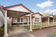  8a Mary Street Glenelg North SA 5045 $520,000 - $540,000 Enjoy the cosmopolitan lifestyle that living in Glenelg offers. This character sandstone fronted maisonette circa 1920 features polished Baltic pine / Jarrah floorboards, high ornate ceilings, leadlight and glazed brick fireplaces. All facilities are within easy reach and include the beach, transport, restaurants, cafes and shopping strip that makes Glenelg such a popular destination. The home comprises 2 generous bedrooms, separate lounge, kitchen / meals and fully tiled bathroom. Additional features of the home include reverse cycle air conditioning, carport and private rear yard. An ideal property where you can walk to all facilities whilst being a great investment in this tightly held beach side location. Not to be missed if you want to live in “The Bay”. 