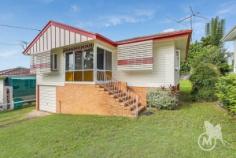 16 Towns Street, MITCHELTON QLD 4053 | Madeleine Hicks Real Estate Brisbane Land Size- 607 Sqm Rates- $621.16 per Quarter Potential weekly rent- $390-$420 per week (un-renovated) After over 50 years of memories, this original post war home has come on the market. Ideally located at the end of Towns street and directly across from park land sits this humble home ready to be renovated by the new owners. Built in 1961 this home offers the avid buyer huge opportunities, tradies will love side access to the huge double bay shed while still offering ample yard space for the kids and pets. Located across for the Heiner Park North, allows you the extra space without any maintenance, and is a huge feature of this home that costs you NOTHING to upkeep! Thanks, Brisbane City Council! The Mitchelton market is on the move, and these original homes are selling quickly to first home buyers, renovators or even new home builders looking for prime land to build on. Just a quick walk to Oxford Park Train station, this is ideal for commuting to the city for work. If you’re in the market for a great home to renovate in Mitchelton make sure you put this home on your open for inspection list! Contact Justin on 0422 292 268 Property Features- -Originally features throughout -Hardwood timber floors under the carpet -Externally painted only 18 months ago -Side access to Double bay lockable garage -Ideally located across from parkland -High and dry at the top of the street -Plenty of under house storage. Land:   607 m² Bedrooms:   3 Bathrooms:   1 