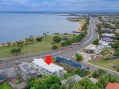  2 / 214 Hornibrook Esp, Woody Point -  Waterfront Properties Redcliffe Sea La Vie – SPECTACULAR BAYSIDE LIVING With brilliant , uninterrupted, beachfront vista featuring the Port of Brisbane, the Brisbane city and the gloriously illuminated bridge at night, your superb residence showcases ultimate in Bayside living. From the spacious courtyard securely protected behind high fences and gate, your new home is ideal for entertaining. Internally there are three large bedrooms, office and state of the art kitchen flowing through to the entertaining and outdoor patio presenting the world at your feet. The kitchen features luxurious, stunning granite benchtops, Two-Pac cupboards and soft closing drawers, quality Bosch appliances, air-conditioning and ceiling fans. The complex has a lift for easy portage of shopping from the two bay garage with double lock-up storage. Designed and built to the latest technological specifications including USB ports in all power points, category 6 cabling and Foxtel points to all rooms, NBN fibre optic to the apartment, video intercom service and crimsafe screens for added security. Your new apartment delivers spacious indoor and outdoor living, complimented by stylish fittings and finishes. Superbly located so that you can revel in the easily accessible water sports, endless waterfront parkland and pathways for walking, jogging or cycling and only three minutes to the local golf and bowls clubs - your long term health is assured when you make the move! Shopping, cafes, restaurants and public transport are a short stroll away. When you need to commute to Brisbane you are on the Bridge within a few minutes. Your ground floor apartment has an exclusive use rear courtyard coupled with a balcony to enjoy the joys of absolute beachfront living. All apartments in this boutique complex have 2 undercover, secure car spaces and double lock up storage units Call Mary today on 0438 054 227 to arrange a VIP inspection. 