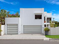  1 Landsborough Avenue, Scarborough -  Waterfront Properties Redcliffe Sleek and Stylish Family Home This modern stylish family home on a 405m2 block has been masterfully designed to make use of all available space. Feature packed this quality built home is supremely appointed and boasts the following: Expansive parents retreat with WIR, luxurious ensuite complete with twin shower, his and hers vanities and double spa bath, private balcony with water views 3 additional bedrooms with BIR  2 Living areas  Media room  Gourmet kitchen with servery to alfresco area + 6 burner gas stove, walk in pantry  Ultra modern main bathroom, ensuite, powder room  Good size laundry  Double lock-up garage + additional oversize garage perfect for the caravan or boat, enough room for all the toys  Relax in the resort style Magnesium pool with spa and waterfall features  Fantastic outdoor area for entertaining  Beautiful established gardens  Fully fenced with intercom at the gate  Solar power  Ceiling fans throughout  Walking distance to Scarborough Village and Southern Cross & Tech Colleges. No expense was spared when this impressive home was built. With too many features to possibly list, this is a must to inspect. Call Mark on 0413 447 576 to arrange an immediate inspection! 