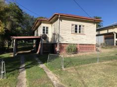  8 Millen St Churchill QLD 4305 Sitting on a huge 1439sqm block this 2 bedroom post war that has had a makeover on the inside, but needing some work on the outside.   There may be the possibility of subdivision or units (subject to Council approvals) Whilst this is currently a 2 bedroom house, it can easily turn into a 3 bedroom with a small adjustment to the entry to the front sunroom.  The kitchen and bathroom were re-modelled a couple of years ago and the dishwasher and stove are reasonably new.  There is a large covered deck off the kitchen. The 2 bedrooms are a good size and the main has a wardrobe.  This property is for someone to live in and do the renovation and enjoy a large yard with potential down the track or a renovator looking at a turnaround.  The property has previously been rented at $260 per week.   This information has been provided to us by third parties and we do not accept any responsibility for its accuracy. You should make your own enquiries and check the information so as to determine whether or not this information is in fact accurate. You must make your own assessment and obtain professional advice if necessary. 