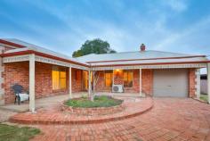  11 Eulinga Dive Mildura VIC 3500 $340,000-$373,000 Ideally located just a short walk from schools, this four-bedroom home offers space, comfort and convenience. A charming bullnose verandah greets you as you approach this gorgeous recycled brick home while manicured gardens add to the quaint and inviting appeal. Set on a 704sqm block, the home is a good size and still offers plenty of outdoor space to host guests, kick the ball with the kids or indulge in your passion for gardening. A spacious lounge is on offer at the front of the home while a light-filled and open-plan kitchen and dining zone sits at the rear, connecting to the outdoor entertaining area. The kitchen is modern and stylish featuring sweeping benchtops, a gas cooktop, breakfast bar and a tiled backsplash. All four bedrooms connect to the main hallway, three with built-in robes and the master with a walk-in robe and an ensuite. Ensuring complete comfort is a slow combustion heater plus evaporative cooling while additional features include the main bathroom with a separate toilet, a single lock-up garage and a double carport large enough for the caravan plus a garden shed. All this is located close to parks, a range of schools plus the vibrant Mildura Central. Photo ID required at all open for inspections. FEATURES: Air Conditioning Built-In Wardrobes Close To Schools Close To Shops Close To Transport Garden 