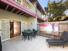  2/17 Martha Street Paddington QLD 4064 $570,000 + Ideally located in the exclusive inner suburb of Paddington, this gorgeous leafy townhouse offers a relaxed and very private city lifestyle that combines practicality and charm within a five-minute commute to the CBD. Federation-style features such as picture glass doors, verandahs and sash windows add character to the thoroughly modern and generous open plan layout, enviable entertaining deck and neutral colour palette of this impeccably-maintained home. Features include: • Expansive open plan dining and kitchen area boasting timber floors and opening onto the rear terrace deck which overlooks the landscaped backyard – ideal for relaxed entertaining with family and friends! • Separate lounge room with timber floors and room for a big screen TV • Two generously-proportioned air conditioned bedrooms, both with built in robes and balconies that offer leafy views and catch the afternoon breezes. • An upstairs bathroom with large corner bath and separate toilet • Functional modern kitchen with dishwasher and plenty of cupboard space • Terrific street appeal featuring a charming courtyard linking your own private front gate with the front verandah • High ceilings throughout & Crimsafe on all doors • Laundry in garage This expansive property boasts a total of 219m2, which includes a remote controlled 2 car (tandem) garage, and is located in a quiet boutique complex that has the benefit of low body corporate fees and onsite visitor parking. With a bus stop just around the corner providing super-easy access to the convenience of an excellent public transport network, the location is truly superb. The events and nightlife of both Suncorp Stadium and Caxton Street are within walking distance and it’s just a short, leisurely stroll to the designer shops, cafes, gym and restaurants of Paddington’s fashionable Given Terrace. Townhouses offering this much space and such a relaxed lifestyle in a prestige inner suburb don’t stay on the market for long. This is modern city living at its charming best so don’t miss your chance to inspect! Currently vacant and ready for occupancy Body Corp approx. $3,900 per annum BCC and Urban Utilities approx. $2700 per annum 