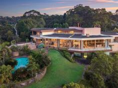  15C Gilwinga Drive Bayview NSW 2104 $5,900,000 - $6,400,000 Hidden in a private bushland setting with a magical sense of serenity, this palatial family home commands sweeping views across the waters of Mccarrs Creek and is one of the largest and most exclusive estates on the Northern Beaches. There are endless possibilities for this including reinstating the tennis court or considering subdivisions. Every dimension of the architect designed layout is generous Grand entrance with expansive and versatile living spaces Wraparound entertainment balcony and alfresco terraces Sauna, billiards room and an idyllic garden oasis with pool Enormous master bedroom, jet spa ensuite and walk-in robe Enormous master bedroom, jet spa ensuite and walk-in robe Solid construction ready for contemporary refurbishment Reinstate the original subdivision of 15d Gilwinga Drive (STCA) Automated garage, tranquil level grounds and lush gardens A rare 2 hectare offering, available for the first time in 31 years 