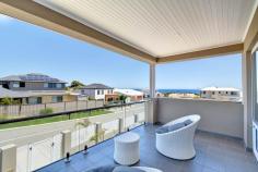  21 Wrasse Corner Yanchep WA 6035 $669,000 - $689,000 Be captivated from the moment you arrive – this prestigious beachside residence is nothing short of impressive with generous open plan design and versatile living spaces, this family home is a dream by the sea. Totally energy efficient with 6.4kw solar electricity, just a stones throw to sparkling beaches, and only minutes from Yanchep Central Shopping Centre, schools, medical facilities, cafes, Yanchep National Park, Golf Course and more, you won’t find better value on the coast! Features of this immaculate home include: + Stunning street appeal with fully enclosed courtyard and decked outdoor lounge area. + Vast open plan kitchen, dining and family areas – gourmet kitchen equipped with stone tops, walk-in pantry, plentiful cupboard and bench space and quality appliances + Step outdoors to an enticing entertainers retreat with built-in BBQ & pizza oven under a large alfresco, sleek split level decking area with heated plunge spa pool and under cover built in bar + King sized master bedroom with spacious double vanity ensuite plus spa bath & walk in robe + 3 queen sized bedrooms with double robes + Semi-ensuite & powder room to bed 1 and a stylish family bathroom for beds 3 & 4 + Upstairs features an expansive living area or 5th bedroom with ample storage, stylish kitchenette, and an inviting balcony area with awesome ocean views VALUABLE EXTRAS: 6.4 kw solar electricity, ducted reverse cycle air-con, downlighting throughout, quality window and floor treatments, double remote garage, low-maintenance gardens to front, electric shutter door to alfresco, ample storage space, laundry and so much more… 