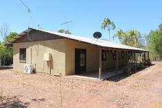  54 Collett Street Southport NT 0822 $299,000 2023 SQM freehold lot ( 1/2 acre) ,fully fenced with cyclone mesh 1500 mm high to perimeter. Situated nearby to the Southport boat ramp for great fishing and crabbing, this is a real fisherman's treat. 4 bedroom 1 bathroom masonry block, open plan home with105 SQM internal living. Mohogany solid timber features in kitchen with gas stove and lots cupboard space. New split air-conditioning in living area. Nice bathroom with separate bath & shower & separate WC. 3.5m wide full length verandah on front and side. 7mtr x 5mtr lock up colour-bond shed with concreted floor and lights plus 2 spare garden sheds. Easy maintenance gardens & 30,000 litre poly tank. Escape the hustle & bustle of city life and move in now & enjoy or rent it out for $300 per week return. 