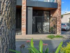  2/12 Hallett Street ADELAIDE SA 5000 Built 2016 of recycled bricks and designed by highly regarded Proske Architects this well positioned ground floor apartment in a group of only four has huge appeal with 2.7m ceilings, solid oak timber floors, plantation shutters and secure entrance with intercom. The open plan living/dining is serviced by a well appointed 2 pac kitchen with stone bench tops, integrated refrigerator, gas appliances & dishwasher. The bedroom features a wall of built-in storage and has a combined bathroom/laundry with floor to ceiling tiles. Close to St Andrews Hospital and Parklands, the renowned Halifax Street restaurants including the popular Greek on Halifax and convenient to Adelaide Central Market. You’ll be captivated by this gem. Specifications:- CT / Volume 6184 Folio 921 Council / Adelaide City Council Zoning / City Living Zone 32 – South Central Policy Area Built / 2016 Internal / 45 m Council Rates / $1608.60 pa (approx.) SA Water / $154.25 pq (approx.) ES Levy / $101.80 pa (approx.) Strata Rates / $399.30 pq (approx.) Strata Manager / Strata Management SA.. 