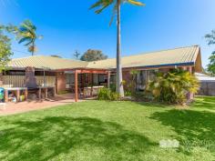  71 BAYVIEW TERRACE, Deception Bay -  Waterfront Properties Redcliffe Spacious lowset home - Walk to the water! A private inspection of this lovely lowset brick family home is a must, as the street view does not do it justice! Located in handy Bayview Terrace, the lush established gardens provide privacy and shade where needed, but you'll also enjoy both sunny aspects and cool sea breezes too. This home has four super-sized bedrooms, two spacious living zones along with a generous entertaining area with its own built-in plate BBQ, which will likely be used as a cosy firepit for the modern entertainer. The current owner has looked after this home meticulously and spared no expense when renovating the huge bathroom just 18 months ago. With an easy option to create an ensuite in the over-sized laundry, this home will be the perfect design for couples and families alike. As is common with the more mature houses, this lovely home has some character, with a gorgeous cathedral ceiling in the front living/dining room and that is complemented by beautiful wooden floorboards. Along the way, there has been updates to the kitchen, extra storage and pantry spaces created, fresh timeless tiles and new ceiling fans in two bedrooms. The massive garaging areas are 7.7 metres long, so can accommodate that tinny or camper trailer easily and you'll still have rooms for your vehicles to be parked on the property. This location is so handy, within short distances of many sporting facilities, shops, schools, parks, the library and of course the waterfront which is just at the end of Bayview Terrace. If you work in the city, you'll appreciate the short, stress-free drive to Burpengary train station and be able to relax with a good book for the 43 minute commute! Jump onto the Bruce Highway within minutes of leaving home - you can even grab Macca's or petrol on the way as these facilities are literally just down the road! This home features: 4 excellent sized bedrooms Massive newly renovated bathroom (+ room for an ensuite) Two living zones Outdoor entertaining with built-in BBQ Massive garaging area Handy location in a good street Tons of storage Two garden sheds Mature gardens providing privacy Wheelchair friendly property ** Floorplan to come soon ** Call Karen Prince now on 0437 015 951 to arrange your inspection! 