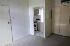  19/2 Tilmouth Court Gillen NT 0870 $165,000.00 This delightful first floor, one-bedroom apartment is set in a safe and secure gated community. In a desirable location close to schools, transport, and shops, and being an end unit, has no passing traffic giving added privacy. The bedroom is of generous proportions, with built in robes, and two-way access to the adjoining bathroom. The well-equipped, fully tiled, galley style kitchen has gas cooking with rangehood, stainless steel fixtures, lots of cupboard and bench space, and a spot for a fridge. Combined bathroom/ laundry area. Ample size lounge/dining area. Under cover car parking, with remote electric gate access for security. Security screens to doors and windows. Solar hot water. ducted evaporative air conditioning throughout. Front and rear balconies offer a place to relax and enjoy the stunning views of the MacDonnell Ranges. Lots of natural lighting. This property would be a perfect start to a new to the market investor, wanting to build an investment portfolio, or the single person looking for peace and security and their own property. 