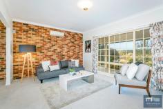  75 Swan Drive Googong NSW 2620 $1,150,000-$1,175,000 Located in tightly held Fernleigh Park, where properties rarely become available and only 25 mins to Canberra CBD is this delightful residence. Privately situated away from the road and accessed via a sealed drive, in a great position to capture 180 degree views, this is a special property! Magnificent panoramic views with sweeping vistas are enjoyed from the wide shady verandahs of this gracious home on a pretty 7.54 ha or 18 acre block. Boasting separate formal lounge and separate formal dining areas, and a wonderful timber country kitchen that flows to the informal living space with raked ceilings. Large ensuite, three way main bathroom, and double garage under roof create a home that is warm and welcoming. Established landscaped grounds with semi-circular driveway, massive shedding (175m2 approx and truck height), grazing, Jerrabomberra creek plus dam complete the picture on this desirable property, which is only moments from the new Googong Township, with schools and all facilities. 