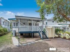  5 KATE STREET, Woody Point -  Waterfront Properties Redcliffe Cottage by the Sea! This charming three bedroom, two bathroom cottage is on a 405m2 block located less than 150 metres to the waterfront! With renovations done approximately 7 years ago (any asbestos removed at that time), you can relax and enjoy this home as a great little investor (great tenant in place) or plan your 'Sea Change'... Situated conveniently in a sought-after side street, 5 Kate Street, Woody Point is east-facing and just a couple of minutes' walk away from all of the best that the Woody Point lifestyle has to offer: The Belvedere Hotel - a great place to socialise with friends and enjoy magnificent sunsets Parkland, playgrounds, the jetty, fishing spots, walking paths Great cafes and eateries Medical centre and Pharmacy Bus stops just metres away It is an appealing location for owner-occupiers or tenants and will retain value over the years due to it's prime position. With fabulous decks from and back, you can relax or entertain with sensational sea breezes in the summer but also find some shade when needed. Features: Three bedrooms 2 bathrooms Open-plan kitchen and living zone Decks both front and back LOCATION - LOCATION - LOCATION Call Karen Prince now on 0437 015 951 to arrange your viewing... As the property is tenanted, I am conducting private inspections only on a Saturday, so you must call to arrange this in advance... 