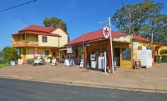  2 Bate St Central Tilba NSW 2546 $985,000 plus SAV Bates General Store and Bed & Breakfast is situated in the historic village of Central Tilba and is an iconic landmark. Central Tilba is also known for the TV show "River Cottage Australia" as it is filmed on a farm just up the road. If you have dreamed of moving to the beautiful south coast, here is your chance to live and work in paradise. Features Include: Three bedroom. one bathroom residence, separate three room Bed & Breakfast with off street parking (each room has an ensuite), very popular general store, fuel sales and post office with 185 mailboxes. The B & B could be easily converted into a second residence. The Two Story Bed and Breakfast has three guestrooms, two located on the top floor and one on the bottom. The Postmasters room has a queen bed, a single bed and it's own ensuite. One of our upstairs rooms has a queen bed and the other a double, both with their own bathrooms. Downstairs is the guest kitchen/lounge and dining area. Set on a 4321 m2 block of land with space to add extra rooms (subject to council approval). The property is very visible as it is first on the left hand side as you turn into Bate Street. There is a double garage with workshop and approval has been granted to build another three car garage at the rear of the property. Central Tilba is a mecca for visitors and locals who enjoy the ambiance and charm of this historic and mostly unaltered quaint village. A short drive takes you past the scenic farm where "River Cottage Australia" is filmed. Sale includes furniture in the Bed & Breakfast (excluding personal items) and training. Stock is at valuation. 