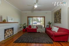  421 Nowland Avenue Lavington NSW 2641 $257,500 A place to call home, together with the picket fence and set in a prime location. I love this street and this home is a classic, tastefully renovated and cared for. Comprising 3 bedrooms, 2 with built-in robes and fans with the 3rd enjoying the adjacent sunroom addition which would make for the perfect study area or kids play area. There is a formal lounge with reverse cycle split system air conditioning, new fans, feature polished Murray Pine timber flooring throughout and a beautiful renovated bathroom. There's a modest kitchen meals with loads of cupboards, a dishwasher so you don't have to slave over the dirty dishes and plenty of natural light that filters through this gem of a home. The separate laundry and toilet are conveniently located toward the rear of the home and offers more storage. You know I love the street and I love the covered pergola with the featured timber decking even more. This is the place to kick back, relax and enjoy the spacious secure yard in peace and quiet or entertain on the weekends for that matter. The property offers a lockable carport, fernery, lockup garage with power and plenty of room for the kids or pets to play. The location is superb and is in walking distance to the shops, sporting ovals, transport and more. If you grabbed a season pass to the local swimming pool, it is conveniently located directly across the road. Perfect for this warm weather, that is for sure. This home has Character, it's extremely well presented and might just be the place for you to call home. Snooze you lose on this one I would imagine! 60252 888. Quick! 