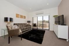  24/29-31 State Circle Deakin ACT 2600 $675,000 If you’re looking at downsizing, searching for your next investment, or if you just crave an easy-care lifestyle, then look no further than this exceptional property at Domain on the Park. Boasting quality and class, 24/29-31 State Circle is located in a prime position. With only a few minutes’ drive to the city, close to parliament house and the buzzing Kingston foreshore, this apartment offers a home away from home experience, with the complex location and size. The kitchen, equipped with state of the art appliances, ample storage and sleek high gloss finishes, flows through to the living areas which are drenched in natural light, with sliding doors through to a fully enclosed study area and entertainers balcony with views of Parliament House. This immaculate apartment also features large secure basement parking with 2 allocated spaces. 