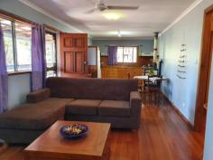  84 CRUMPTON DRIVE BLACKBUTT NORTH QLD 4306 $320,000 This 2 bedroom home with builtins, has polished floors, a woodstove to cook on in winter to keep you warm & an electric stove to cook on in summer. It has 3 ceiling fans, fully screened, and a verandah on 2 sides. The property has a 40x20 lock up colour bond garage, to park 3 cars and a workshop area with power, water , tiolet and the laundry. This property also has a large storageshed/animal shelter , which is 3/4 concreted with a 40x20 fenced area. The block has been selectived cleared with a dam, and is nearly fully fenced , with good fertile soil for growing. It backs onto the rail trail, which is popular as a walking track, horse riding , or push bike riding. 