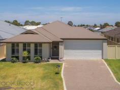  87 Lennox Drive Secret Harbour WA 6173 $469,000 A gorgeous seaside setting in a well-serviced community gives this large family home plenty of appeal. The property boasts 4 bedrooms, 2 bathrooms, a study and media room. The fully fenced backyard with a sheltered entertaining area surrounded by lawns ensures carefree outdoor living while the park opposite and easy access to the beach, local shopping centre and schools set the stage for a well-rounded and delightful life. 4 bedrooms 2 bathrooms 2015-built brick and iron High ceilings large rooms Sep study & media room Central open plan living 2-car garage shoppers ent Covered alfresco entertain Side entry to F.F. backyard 548sqm Indian Ocean coast Opposite park, close beach A large front door opens to the wide entry with high ceilings. Set to one side of the entry is the spacious main bedroom suite with a walk-in robe and stylish modern ensuite with stone benchtops, shower and separate W.C. The tiled floors of the entry lead to the well-proportioned media room. This carpeted space offers the perfect venue for at-home movie nights and uninterrupted gaming. A large, carpeted study provides a flexible ‘quiet’ area away from the central open-plan living zone. With high ceilings, a light colour scheme and ample windows the open plan kitchen/meals/family room is sure to become the focus of much of day-to-day life. In the well-appointed kitchen, double ovens, stone benchtops, a 5-burner gas hob, a dishwasher and a walk-in pantry fashion a practical and stylish workspace. Easy access to the alfresco entertaining area makes for seamless indoor-outdoor living with relaxed family meals sure to be on the agenda. A separate junior bedroom wing houses 3 good sized bedrooms with mirror-fronted built-in robes. The light and bright bedrooms share the family bathroom – a practical, modern space with tub, shower and vanity – and a separate W.C. A walk-through laundry with a double, full-height linen press and a separate storage cupboard complete this wing of the home. This family home makes daily life just a little easier with tiled floors in the high-traffic areas, ducted reverse cycle air-conditioning and automatic reticulation to the lawns. Ready and waiting for a new family the home delivers multiple living areas, a large, comfortable main bedroom suite and a separate junior wing. Secret Harbour offers residents an ideal balance of services and amenities on the Indian Ocean coast. Well-maintained parks and gardens, a golf course and the Surf Life Saving Club create the framework of an enviable lifestyle with nearby arterial road and public transport links to the Perth CBD. To arrange an inspection of this property or for the best advice, the best service and the best solutions call “The Expert” Ken Wiggins on 0403 012 950 BE SEEN – BE SOLD – BE HAPPY Do you want your property sold? For professional photography, local knowledge, approachable staff, a proven sales history and quality service at no extra cost call the Brookwood Team.. 