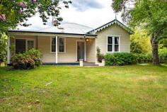  197 Railway Ave Bundanoon NSW 2578 $749,000 So many grand old features make this cottage a must to inspect from the deep front verandah overlooking the garden to the deep blue front door. The home offers a lightness and airiness rarely found in these old homes due in part to its elevated location and flexible floor plan. Freshly painted interior and high ceilings with decorative cornices + chair rail Character bathroom with claw foot bath, free standing shower, vanity and w/c Large laundry to the rear with second w/c Stunning sun room with escarpment views and rural outlook Timber country kitchen with generous dining space opening onto a cosy lounge with fire place An array of charming windows, French doors, bi-folds and light wells throughout Master bed has built in robe and like the 2nd bedroom is very spacious 3rd bedroom or home office accesses the front verandah Scope to make improvements and add to the existing charm of this cottage Stunning block of land with single detached garage, fencing and a pony paddock with stables at the rear. A garden awaits this fabulous block with quality soil and a selection of ornamental trees at the front. Sit and relax on the new deck off the rear of the cottage and admire your breathtaking view over this pretty parcel and beyond. 