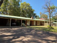  386 Maddington Road  Orange Grove WA 6109 $850,000 Positioned on an elevated 2.9 acre block in leafy Orange Grove, this massive family home is looking for a new owner to enjoy an idyllic lifestyle. Features include: Tree-lined entrance driveway Approx 450sqm under main roof incl carports Tranquil entertaining area with below-ground pool Superb outlook from entertaining area and lawns 4 good-sized bedrooms with built-in or walk-in robes Large fitted-out office with external access Parents retreat or gymnasium Huge formal lounge Large open plan kitchen, dining and family area Centrally located wood-burner fireplace Split-system and evaporative air-conditioning Quality kitchen appliance and granite bench-tops Separate games room with bar-area opening on to swim-up bar Triple carport parking Large garage/workshop Bore reticulated lawns and gardens Solar electric system Smart power connected Brick stable block with 4 horse boxes with day yards 1 bedroom teenage retreat with living area and mezzanine lounge Big flat horse paddock at rear 30 minutes to Perth CBD Quick access to Tonkin and Roe highways 10-15 minutes to Perth Airport A short walk to Orange Grove Primary School Very close to Karinya Park Equestrian Centre on Grant Street View at an advertised home open or call Craig Phillips on 0410 588 427 to arrange a private inspection. FEATURES: Air Conditioning Built-In Wardrobes Close To Schools Garden... 