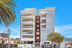  15/10 Thomas Street  Wollongong NSW 2500 $549,000 - $599,000 In a stylish c.2018 complex, this light and bright security apartment epitomises easy living with its crisp neutral palette, modern open-plan layout and stunning escarpment views from a fourth-floor vantage. Flowing in/outdoor design underpins its vast appeal - offering an all-weather entertainers' balcony and alfresco access from the generous living zone and both bedrooms, a high-impact executive lifestyle is utterly assured. Split-system air conditioning and a sparkling residents' pool will delight through the summer months, while a sensational CBD address provides flawless day-to-day convenience. Features: Entry hall leads to beautifully integrated lounge/dining area Sleek wall-to-wall bi-fold doors connect to handsome balcony Gas-equipped kitchen boasting stone bench tops and dishwasher Private balcony off master bedroom; built-ins throughout Chic bathroom, separate laundry, secure parking with storage Cafes, transport and Crown St shopping just footsteps away.. 