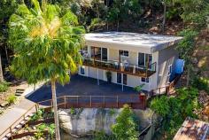  62 Beryl Bvd Pearl Beach NSW 2256 $1,580,000 - $1,680,000 Welcome to a fantastic opportunity in unspoiled natural paradise at Pearl Beach. Featuring seven bedrooms in total with four bathrooms including an ensuite to the main bedroom, two kitchens, and a large verandah for relaxing and entertaining, the entire family can live comfortably in this home as they enjoy the ambiance of the beach nearby.  The second fully self contained 2 bedroom house could be rented for up to $30,000 per year extra income. This outstanding property is immaculate presents as new and Suits up to 3 families. Large groups or multiple rental income opportunity. An outstanding feature of this unique property is that each feerstanding house is fully landscaped, private and secluded from the other.  