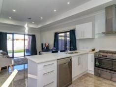  1A Wright Ave Northfield SA 5085 $420,000 - 425,000 Sanjay Patel of Northgate Real Estate is proud to present this stunning 2015 constructed Torrens title home with 3 Bedrooms plus an office. Ideal for a wide range of buyers - first home buyers, young families, down sizers and those looking to add to their property portfolio. Premium features of this luxurious home include an open plan kitchen/dining area with a deluxe design, equipped with quality gas appliances and Caesarstone benchtops. The large master bedroom comes complete walk in robe and en-suite featuring a large double shower with 2 large rain shower heads. Bedroom 2 is equipped with built in robes. The separate laundry room and double-glazed sliding doors provide access to the specious tiled alfresco under main roof.Ducted Air-conditioning zoned for efficient keep you comfortable all year round. The garage under main roof with automatic panel lift door keeps the car safe and covered, with the added benefit of off- street parking for the extra family cars. Close to the shops, quality primary and secondary schools, public transport – the location is perfect for just about anyone. At a glance: - Contemporary 3 bedroom home plus office - Architecturally designed and rendered facade - 600mm polished porcelain tiles - 2-pac kitchen cabinets - Caesarstone benchtops - 900mm stainless steel freestanding oven and cooktop - 900mm glass canopy rangehood - Stainless steel Bosch dishwasher - Floor to ceiling tiling in bathroom and en-suite - Spa Bath - Large rain shower to bathrooms - Double shower in en-suite - Chrome Semi frameless shower screens - 2-pac vanity cupboards - 3m high coffered ceilings in master bedroom and kitchen/living/dining area - Fujitsu ducted reverse cycle air-con - Secure garage with panel lift door - LED downlights - Full height mirrored robes in bedrooms - Spacious tiled alfresco (under main roof) - Lawn area for kids and pets to play 