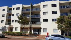  5/88 Lakeside Dr Joondalup WA 6027 $289,000 RITZY TWO STOREY JOONDALUP CBD APARTMENT Spacious, modern 2 storey apartment. Lift access to first floor internal staircase. Ground floor incorporates entrance from front of building and 24m2 of multi-use space. Ideal for home business operation or a second bedroom. Upstairs is a spacious one bedroom apartment of approx 56m2 plus 10m2 of balcony, one allocated car bay and a storeroom. Centrally located in modern complex with pool and under cover BBQ area. The total strata area allocation is 107m2 which represents outstanding value. Be quick to secure this as an investment or live in opportunity. Must inspect to appreciate the value. Area Breakdown: Internal apartment – 80 sqm Balcony – 10 sqm Carpark – 13 sqm Storeroom – 4 sqm Features Air Conditioning Built-In Wardrobes Close To Schools Close To Shops Close To Transport Secure Parking 