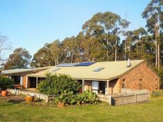  140A Stony Rise Road Stony Rise TAS 7310 $499,000 Boasting very generous 287m2 layout, this proud residence is the absolute family sanctuary with feature brick and quality feature timber interiors with a selection of formal and casual living areas. It includes a large workable kitchen area with breakfast bar and computer alcove. The property is located just minutes away from a new shopping complex adjacent to the Bass Highway, yet encompassed by natural bush and pasture setting.The Northern boundary has new trees planted for privacy along with an array of fruit trees which are a welcome addition. A standalone single garage/workshop, plus large carport affixed to the home offers a practical addition. A huge extension, is used as a workshop/garage with adjoining rumpus, offering potential for numerous bedroom expansion for the growing family… 