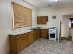  65 Fairbank St Ballidu WA 6606 $69,000 Are you looking to get out of the rat race & enjoy some fresh country air? Keep reading...  This 2 bedroom 1 bathroom fibro & colourbond home with a sleep-out sits on a 993sqm corner block in the cosy & quiet town of Ballidu.  Large front lounge room is carpeted with freestanding wood fire, provides plenty of space & has access to carport through side sliding door.  Dining room comes off the lounge room & has wall mounted air-conditioning.  Kitchen is basic with single stainless steel sink & gas cooking.  Both bedrooms are carpeted with the main room having ceiling fan, NBN connection point & a Foxtel point.  Bathroom is a combined shower/bath recess with freestanding vanity.  A carpeted sleep-out at the rear of the home & could be utilised as a sewing room, office or 3rd bedroom.  Electric hot water system. Ducted A/C.  Ample space out the back with back lane access just needing a spruce up!  This home is waiting for someone to come & show it some love. A little bit of elbow grease & she will come up a beauty!  To arrange your inspection or for more information please call ALEISHA COAD on 0457 079 000. . 