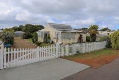  8 Foy Street Esperance WA 6450 $299,000 The desired location of this cute character cottage plus the generous 1139 sqm block is sure to please the astute investor. A white picket fence and immaculately kept gardens, surround the comfortable 3 bedroom, 2 bathroom home with big eat-in kitchen, lounge, 2 x rev cycle aircon, c/fans and gas bayonet. 6m x 9m double garage, 6m x 6m workshop and solar panels. 