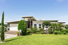  12 Cloudwalk Drive Maleny QLD 4552 $699,000  Fresh and functional this architecturally styled home will appeal to someone who appreciates good quality. Step into the foyer that leads to a lovely living room - dining and contemporary white kitchen. Lots of light and pretty views. Plus the Butlers pantry (lots of storage) and a combined laundry and airing room are adjacent to the kitchen making it the ideal utility area. Very generous easterly facing covered deck expands the living and entertainment area. Upstairs the Master bedroom looks out over the deck. Ah! morning sunshine (Ensuite & WIR). 3 additional bedrooms and a family bathroom cater for family or guests. Throughout the home are beautiful Tasmanian Oak polished timber floors. High planing ceilings are on the upper level providing a lovely airy environment. The expansive exterior decks and the garage floor are all hardwood. There is potential under the house to build in further rooms subject to council approval. Lovely country views of lush green pasture and neatly landscaped grounds add to the ambience of this home. No neighbours either side. Double car garage. Walk to Maleny Township. Beautifully presented awaiting a new owner. Call Geoff Wells 0418787060 