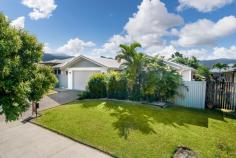  32 Archibald Street Edmonton QLD 4869 If you're after an affordable family home with lots to offer that is minutes to shopping and sporting this property should be at the top of your list. Positioned on a level and low maintenance 570m2 block and located just 20 minutes from Cairns City centre and the popular Cairns Esplanade. Inside, the home offers a spacious and modern tiled open plan design with a neutral colour scheme and easy access through double sliding doors flowing seamlessly onto the large private undercover rear patio. Enjoy the atmosphere of the private gardens all year round. The galley style kitchen is well kitchen designed for family living and entertaining across all scales and is appointed with stainless steel appliances, granite benched and ample preparation space, breakfast bar, corner pantry, new dishwasher and plumbed ready for your fridge and has easy access to meals and living. Offering a spacious master suite with walk in robe and en-suite complete with double vanities and sliding door opening to patio. The remaining two bedrooms are built in, generous in size and carpeted. These two bedrooms are serviced by a second bathroom, finished with a bathtub, large shower and single vanity. Other notable features include: • 	 Office nook • 	 Internal laundry with bench space • 	 Air conditioned and security screened throughout • 	 Linen cupboard • 	 WasteMaster food waste reduction system • 	 Double remote car accommodation with internal access • 	 Low maintenance reticulated established gardens • 	 Security camera system • 	 Tinting to some windows • 	 Sound system to patio and lounge • 	 Generator change over switch • 	 Work bench and shelving to garage • 	 Safely fenced to rear • 	 Garden shed • 	 Vegetable garden • 	 Double power points throughout the home • 	 4kw Enphase solar • 	 2019 outside painting with reflective paint (eaves and walls) This home will appeal to all and simply must be viewed with an asking price in the high $300's range. Call Therese Plath on 0418 772 995 or email at therese.plath@raywhite.com FEATURES: • 	 Air Conditioning • 	 Built-In Wardrobes • 	 Close To Schools • 	 Close To Shops • 	 Close To Transport • 	 Garden 