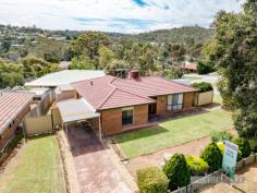  2 Onyx Road Mount Richon WA 6112 $349,000 Just a stroll to main shopping and transport, yet away from the main road. This 3 bedroom home is beautifully presented and you can just move straight in. A really well balanced floor plan, offering formal Lounge and formal Dinning as well as a Family room adjacent to the kitchen. The modern Kitchen overlooks a terrific north facing patio and elevated outlook. The Bathroom is sparkling, and has been renovated too. Th bonus is gas all round. Cooking , HWS and gas points for heaters. This is a big 716 SQM corner lot and you have fantastic access to the lockup powered workshop through a secure side gate. Perfect for the tradie or hobbyist. Boasting reverse cycle and ducted evaporative air conditioning you be cool for sure. The owner would consider renting back if the opportunity was there or you can move right in. Neat, well located and very affordable. Get in quick. Call Luke to inspect NOW. 