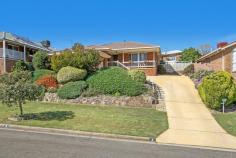  3 Orchard Way Lavington NSW 2641 $355,000 A charming and inviting three-bedroom family home with a northerly aspect enjoying the views over the surrounding Lavington/Hamilton Valley locale. Situated on a comfortable 657 sqm allotment with beautiful manicured gardens and surrounding quality homes this delightful property features: * Main bedroom with large built in robe, ceiling fan and ensuite + two further bedrooms all with built in robes and ceiling fans. * Formal living room with gas wall furnace, ceiling fan and large bay window taking in surrounding views. * Galley style kitchen with ample storage, double pantry, rangehood, gas cooktop and brand-new stainless-steel oven. * Formal dining located area adjacent to the kitchen opens onto an undercover entertainment area complimented by established gardens. * Main bathroom with bath, shower, separate toilet and powder area including single vanity. * Ducted evaporative cooling throughout + additional gas wall furnace located in the dining area. * Lock up garage with remote access, additional car space, front veranda and single gate rear yard access. * Superb street appeal with low maintenance front and rear gardens. * Council rates approx. $1414.27 PA, Water rates approx. $852.45 plus consumption PA.. 