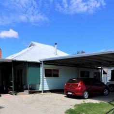  14 Wellington Street KERANG VIC 3579 $249,000 This unique older style home is centrally located and has room for the family, numerous cars and the boat. The home offers: • 4 Bedrooms plus study or 5th Bedroom and full ensuite facilities • Main bathroom is complimented by a luxurious spa bath • Rustic style kitchen serviced by a good size walk in pantry, dishwasher, electric cooking • Huge open living area with evaporative cooling, split system, ceiling fans and 2 wood heaters • Large enclosed outdoor entertaining room • Wood heater incorporating an oven • Good size shed, solar panels and a spacious backyard • 2 Carports with 6 car spaces Walk to the shops, transport and a choice of schools. This home is a must see to be fully appreciated. Lots to offer the lucky buyer – book your inspection today. 