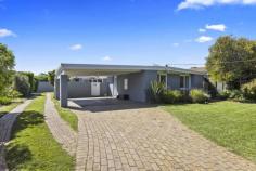  25 Kennedy St Blairgowrie VIC 3942 $900,000 - $990,000 Filled with light and natural ambience, a bank of concertina doors create a seamless connection with the outdoors at this delightful three-bedroom home just a short walk to Blairgowrie’s long sandy beach and along the shore to the village cafes. Immaculately presented with a real holiday vibe and superbly positioned, a wide brick-paved driveway leads up to a double carport and the front door, while a second driveway journeys past the house to a lock-up garage at the rear with plenty of room to store all the beach toys. A sun-trap courtyard deck and living area with polished timber floors and a crisp white colour scheme is the entertaining heart of the home with a separate dining area boasting a timber feature wall. The kitchen is timeless in all white finishes and includes a ceramic cooktop, stainless-steel wall oven and dishwasher, room for a breakfast table and a handy servery to the lounge. A sparkling main bathroom offers a shower, bath, modern vanity and chocolate colour scheme, while the master bedroom provides parents with a gleaming all-white ensuite and walk-in robe. The home also features split-system airconditioning, a covered rear veranda, secure front gates and easy-care gardens to give you more time at the beach!. Hockingstuart | Belle Property is proud to be offering this property for sale. To arrange an inspection or for further information, please contact Tony Colles on 0407 382 140 tony.colles@belleproperty.com 