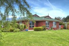  201 Emu Bay Rd Deloraine TAS 7304 $469,000 Great family home on an approx. 1400m2 block with fantastic views of the Great Western Tiers. Solid brick three bedroom home, the master bedroom has a walk in robe and ensuite and the two bedrooms have builtin robes, plenty of linen cupboards for all you storage needs. Open plan kitchen with pantry and spacious dining room, large separate lounge room with wood and electric heating and a good sized family room. There's an office or it could be utilized as a  nursery, the bathroom has a bath, shower and vanity, there's a separate toilet and laundry. Bonus of solar hot water to ease the power bills. This property is ideal for the Purchaser wanting plenty of space inside and out, large garage and carport also a fenced back yard. Call Virginia for your private inspection. 
