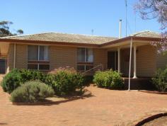  11 Janes Dr Corrigin WA 6375 $170,000 1972 Built brick veneer home. Freshly painted and new carpets, 3 good sized bedrooms plus 4th bedroom with shower and WC. Approx 172m2 of home plus rear patio and front porch. The property features; Electric cooking. Ducted reverse cycle aircon (as new). Solar H/W/S. Paved at rear between sheds and rear patio 2 bay lock-up garage. 2 bay O/F garage. Very well located and would suit a family also 1st home buyer. Water Rates: $1463.15 approx. Land Rates: $996.72 Contact Bob Davey on 0417 946 713 or the office on 9622 8499. 